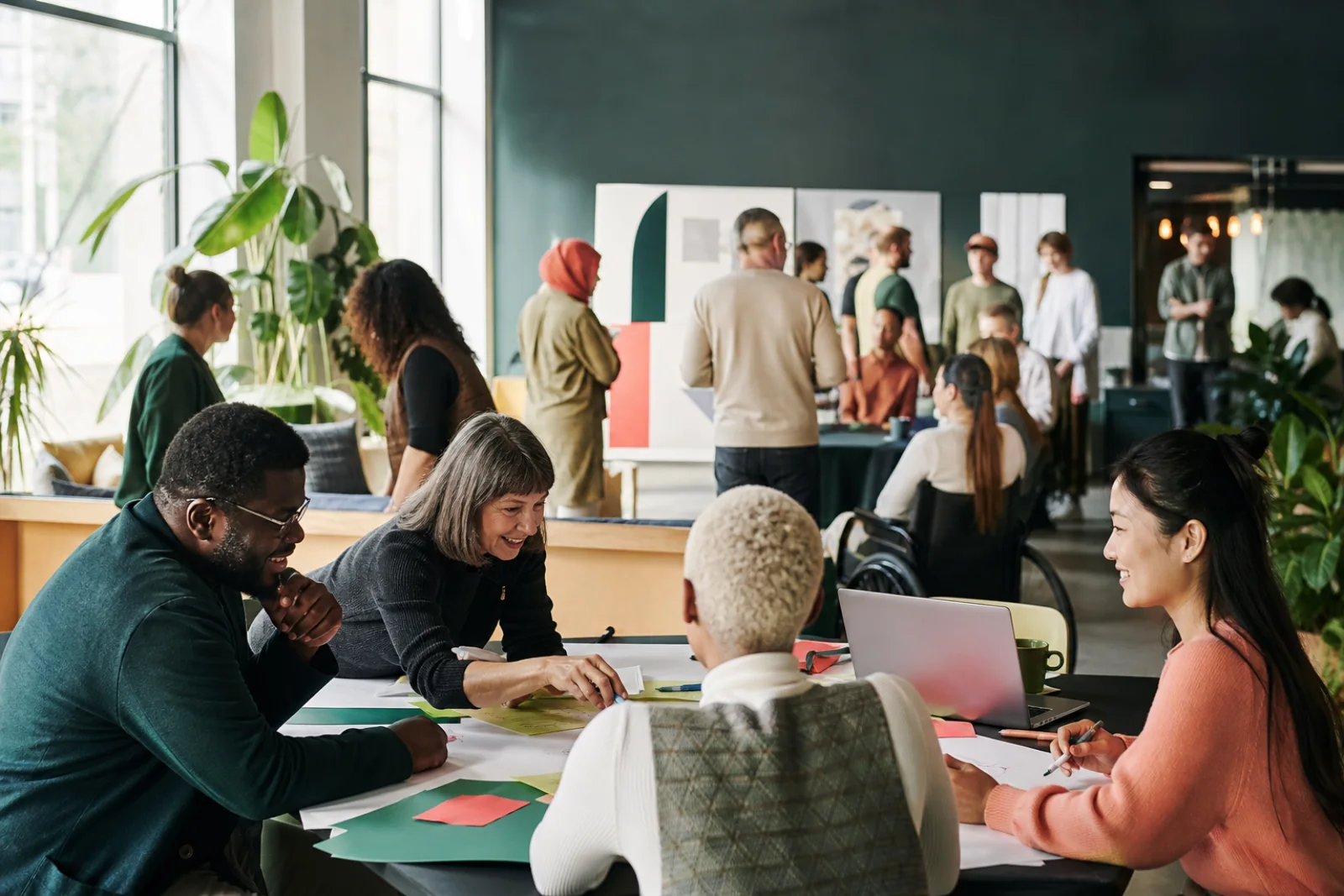 Diverse charity and membership community collaborating at an inclusive event